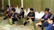 Hmong ladies making cloth Hmong ladies making cloth