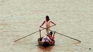 Rowing boat on the Mekong Rowing boat on the Mekong