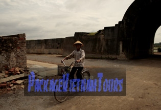 Boy enjoying fun cycling around the Ho Citadel in Thanh Hoa Province Boy enjoying fun cycling around the Ho Citadel in Thanh Hoa Province