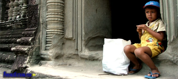 Boy at a temple of Angkor Boy at a temple of Angkor