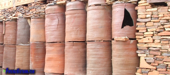 A wall made of broken vases in Tho Ha Village A wall made of broken vases in Tho Ha Village